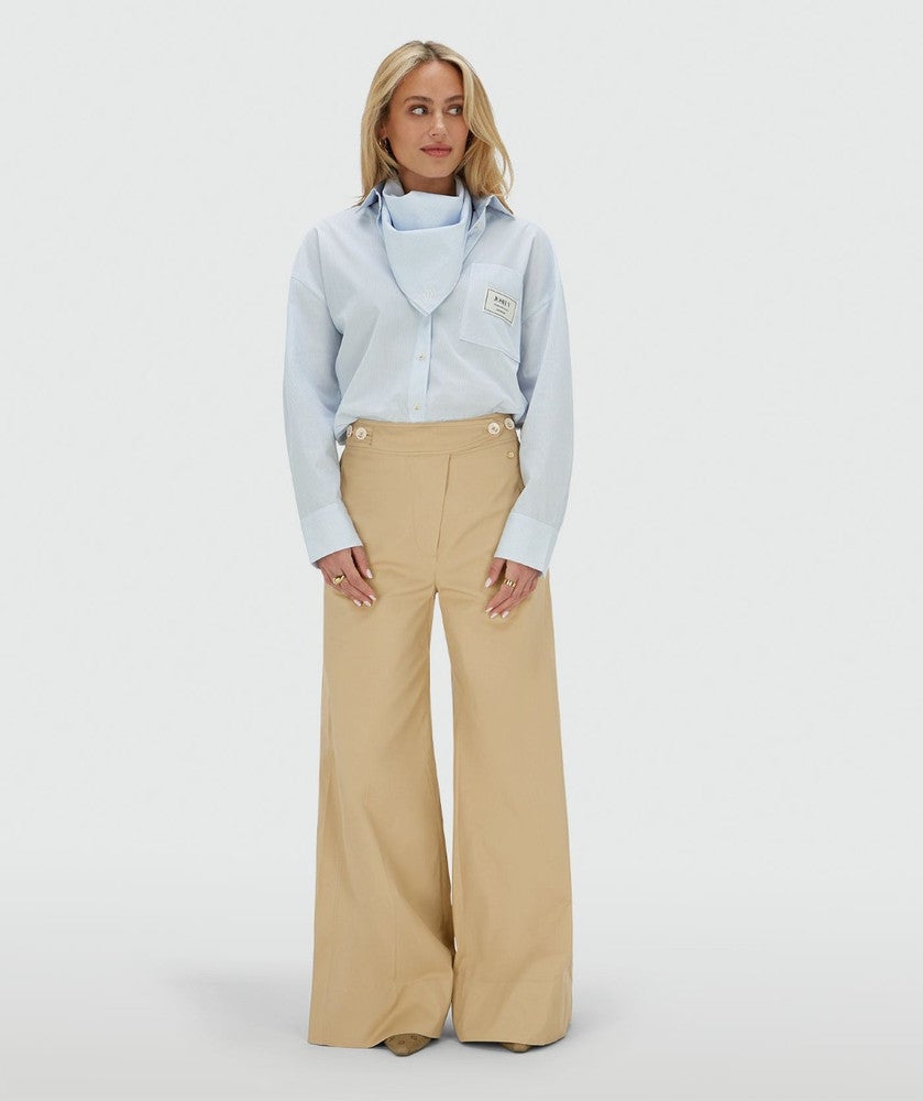 NEVEAH oversized blouse met sjaaltje Licht Blauw NEVEAH oversized blouse met sjaaltje Licht Blauw