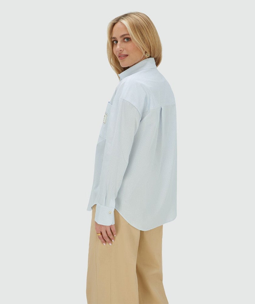 NEVEAH oversized blouse met sjaaltje Licht Blauw NEVEAH oversized blouse met sjaaltje Licht Blauw