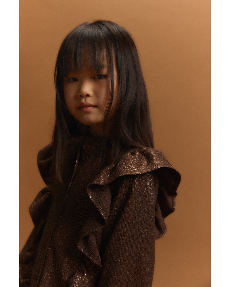 kids knitted shiny ruffle blouse Bruin 1 kids knitted shiny ruffle blouse Bruin 1