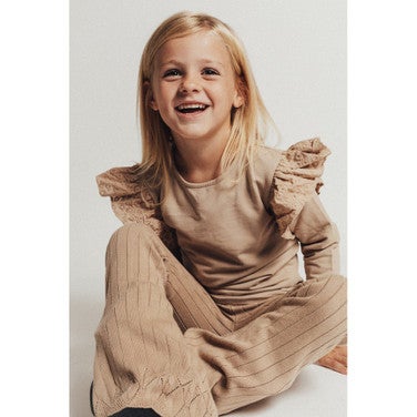 Alicia Jersey Ruffle Top Bruin 1